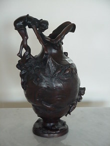 GIRL ON VASE W/ MANS FACE FISHING