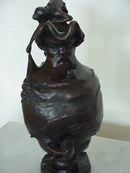 GIRL ON VASE W/ MANS FACE FISHING