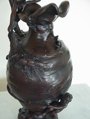 GIRL ON VASE W/ MANS FACE FISHING