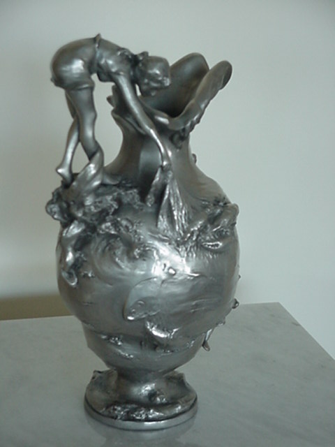 GIRL ON VASE W/ MANS FACE FISHING