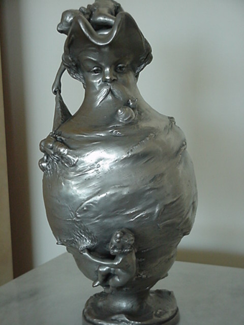 GIRL ON VASE W/ MANS FACE FISHING