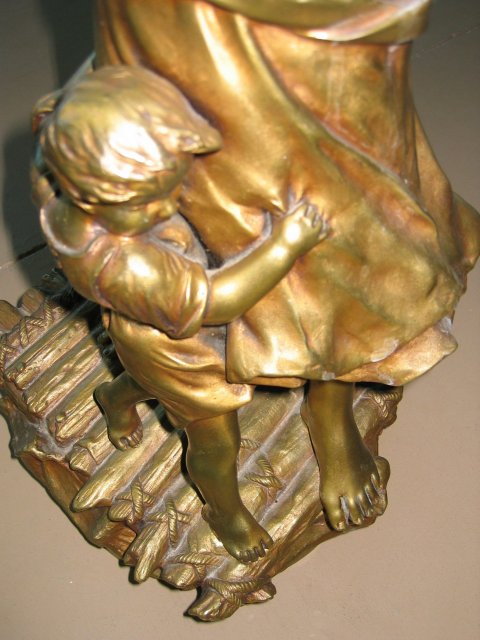 Woman W/young Child on a Raft