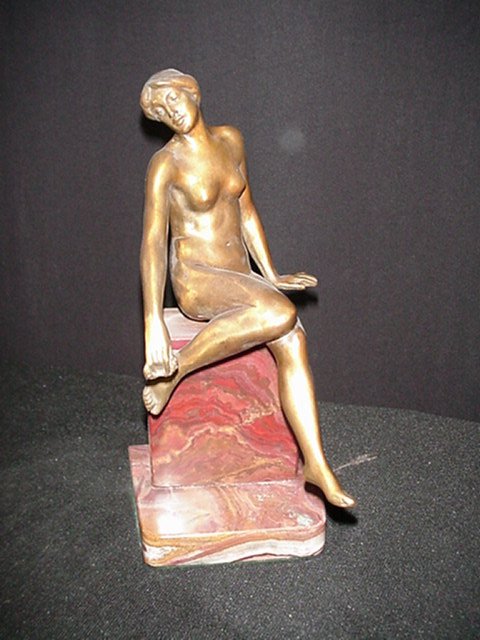Bronze Figurine/Seated Girl on Wall