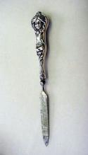 Art Nouveau nail file figural face flowing hair