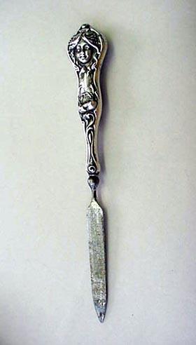 Art Nouveau nail file figural face flowing hair