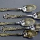 5 ornate citrus spoons sterling silver c-scrolls