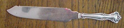 Cromwell Gorham Co serrated cake saw sterling