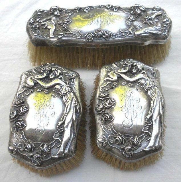 Figural woman with cherub baby roses brush set