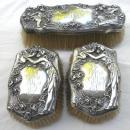 Figural woman with cherub baby roses brush set