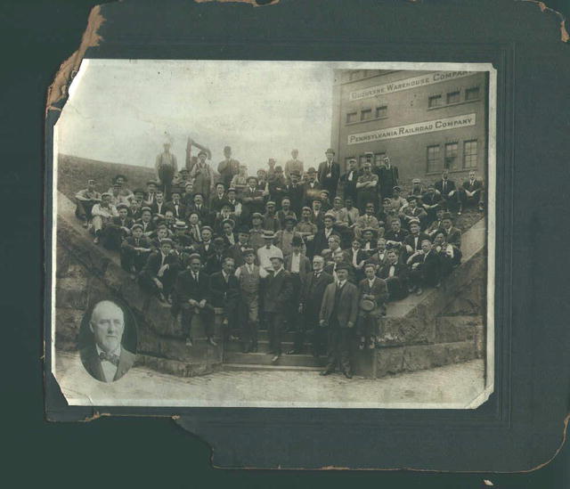 Photo of Men in Front of Building 24 P.R.R.