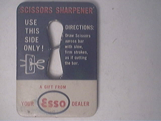 c1940 ESSO and ATLAS Bucron Tires Scissors Sharpener
