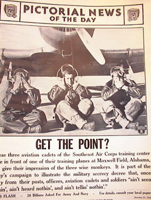 THREE AVIATION CADETS POSE IN FRONT OF PLANE