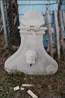 Concrete fountain Childs head