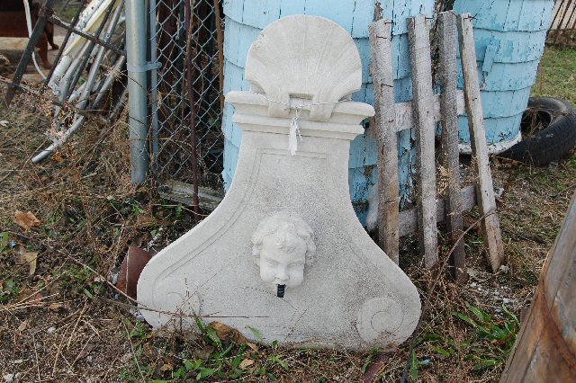 Concrete fountain Childs head