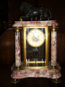 A Impressive French Portico Clock with Bronze Lion