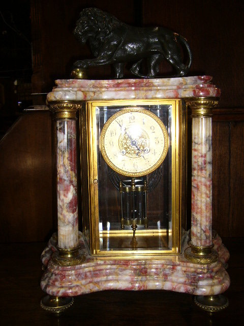 A Impressive French Portico Clock with Bronze Lion
