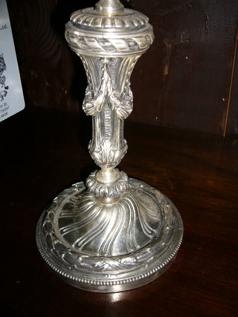 A Nice Pair of Bronze Silver-Plated Candelabras