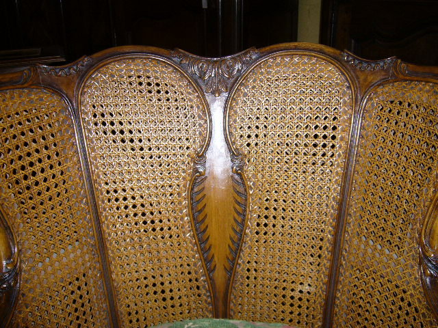 A Superb Pair of French Walnut Caned Parlor Charis