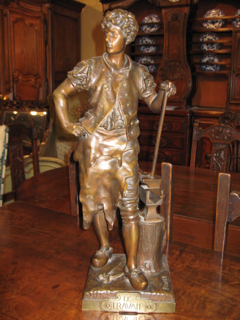 An excellent French bronze sculpture of a blacksmith