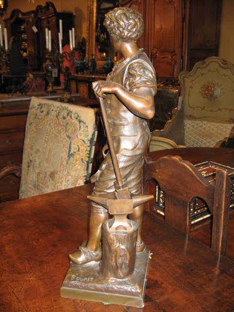 An excellent French bronze sculpture of a blacksmith