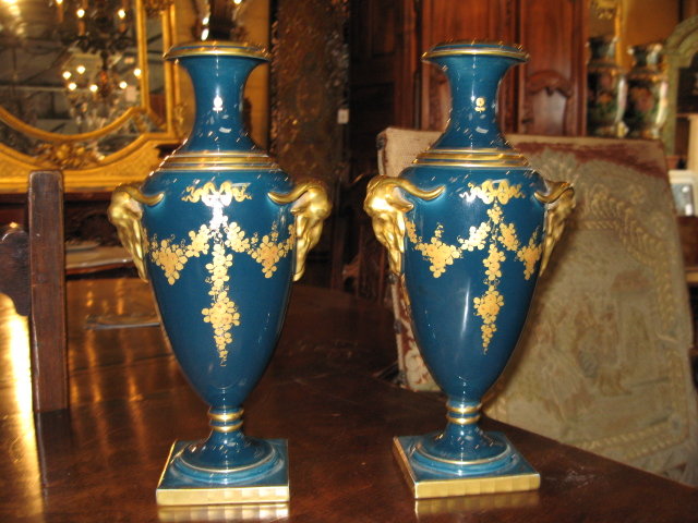 A nice pair of signed French porcelain vases