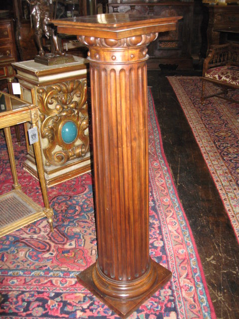 A handsome French carved walnut pedestal