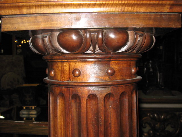 A handsome French carved walnut pedestal