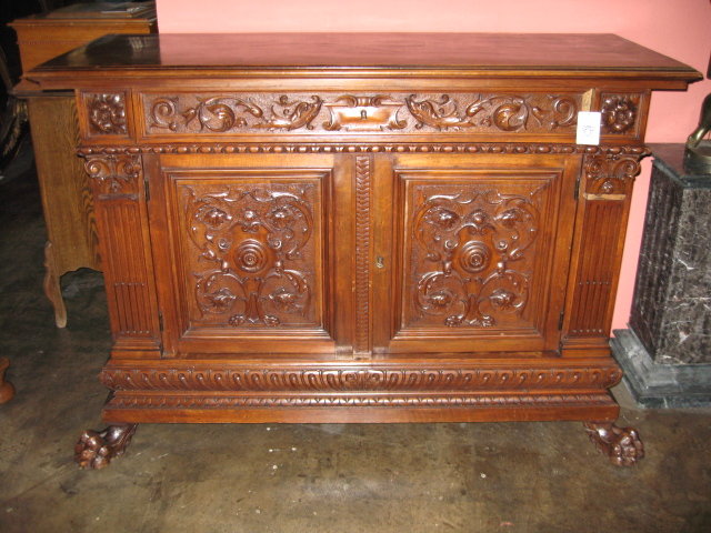 A handsome Italian Renaissance carved walnut buffet