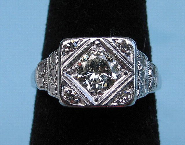 GOOD PLATINUM .6 CARAT DIAMOND RING GOOD STONE 5 TOTAL