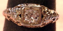 18K WHITE GOLD FILIGREE RING .50 CARAT DIAMOND 2 SIDE STONES