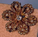 14K STARBURST SEED PEARL AND 1/4 CARAT DIAMOND PIN