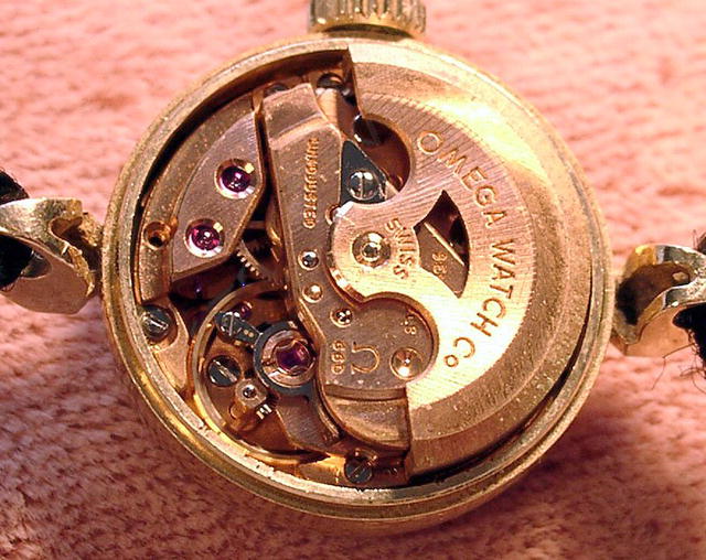 LADIES 14K OMEGA LADYMATIC WRIST WATCH FACETED CRYSTAL