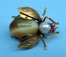 FINE 14K GOLD BUG WITH TIGERS EYE PEARL BODY RUBY EYES