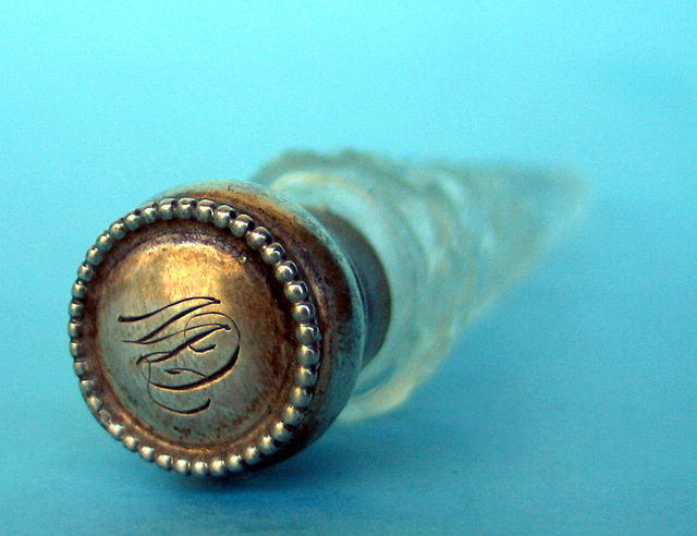 FINE CUT GLASS AND STERLING LAYDOWN SCENT PERFUME BOTTLE