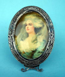 FINE STERLING AND CELLULOID PICTURE FRAME NEAT