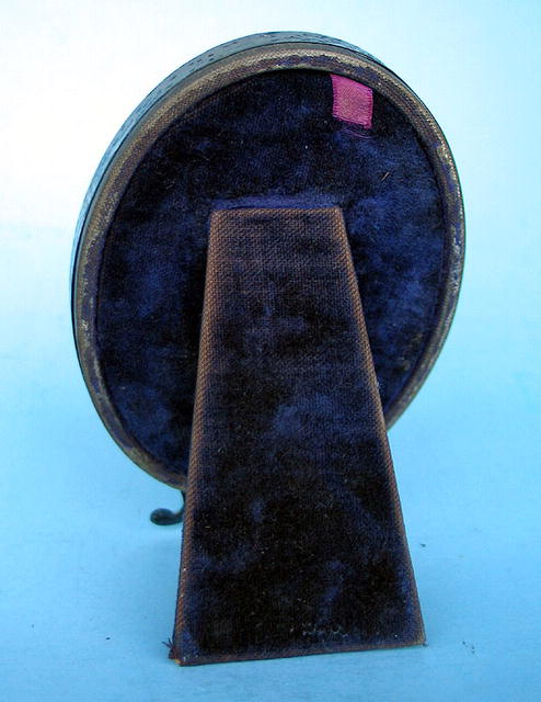 FINE STERLING AND CELLULOID PICTURE FRAME NEAT
