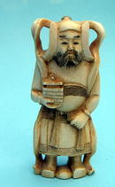 NICE CHINESE OKIMONO IVORY OF DIETY OR EMPEROR