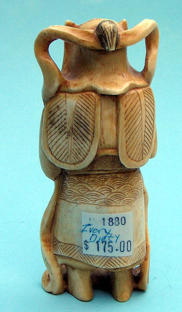 NICE CHINESE OKIMONO IVORY OF DIETY OR EMPEROR