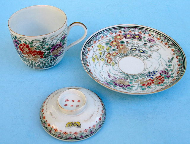 FINE MEIJI JAPANESE SATSUMA COVERED CUP AND SAUCER