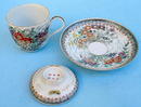 FINE MEIJI JAPANESE SATSUMA COVERED CUP AND SAUCER