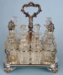 FINE ENGLISH STERLING 7 BOTTLE CASTOR SET FRAME 1861
