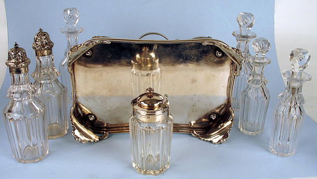 FINE ENGLISH STERLING 7 BOTTLE CASTOR SET FRAME 1861