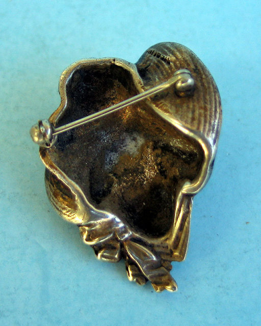 Very nice and well done silver pin or brooch of a 1900s woman with a great hat on. About 1.5