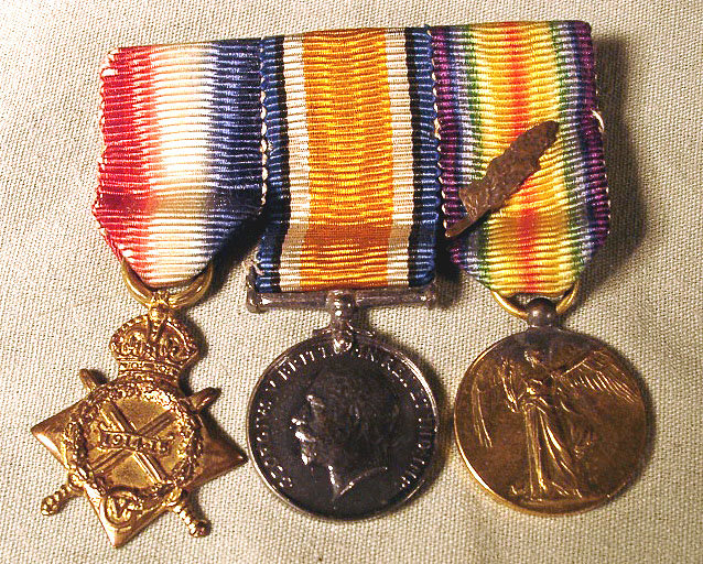 Very nice set of English WWI medals from the firm of Spink and Son Piccadilly. Includes original box extra ribbon and 3 medals set on a bar pin. Fantastic set in excellent condition. About 2