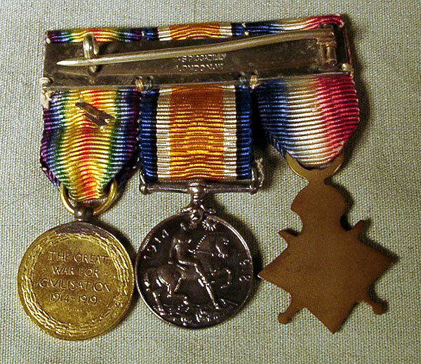 Very nice set of English WWI medals from the firm of Spink and Son Piccadilly. Includes original box extra ribbon and 3 medals set on a bar pin. Fantastic set in excellent condition. About 2