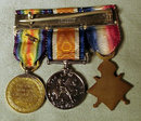 Very nice set of English WWI medals from the firm of Spink and Son Piccadilly. Includes original box extra ribbon and 3 medals set on a bar pin. Fantastic set in excellent condition. About 2