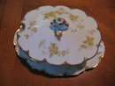 Haviland Limoges covered sauceboat with attached underplate, yellow roses