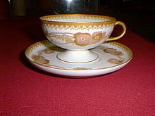 Haviland Limoges Fancy pedestal tea cup and saucer, lots of gold