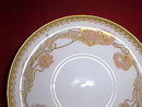Haviland Limoges Fancy pedestal tea cup and saucer, lots of gold
