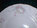 Haviland Limoges bread/butter plate, wreath of pink roses w/blue ribbons